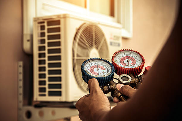 Professional Air Conditioning Service technician working in Sharpsburg, PA